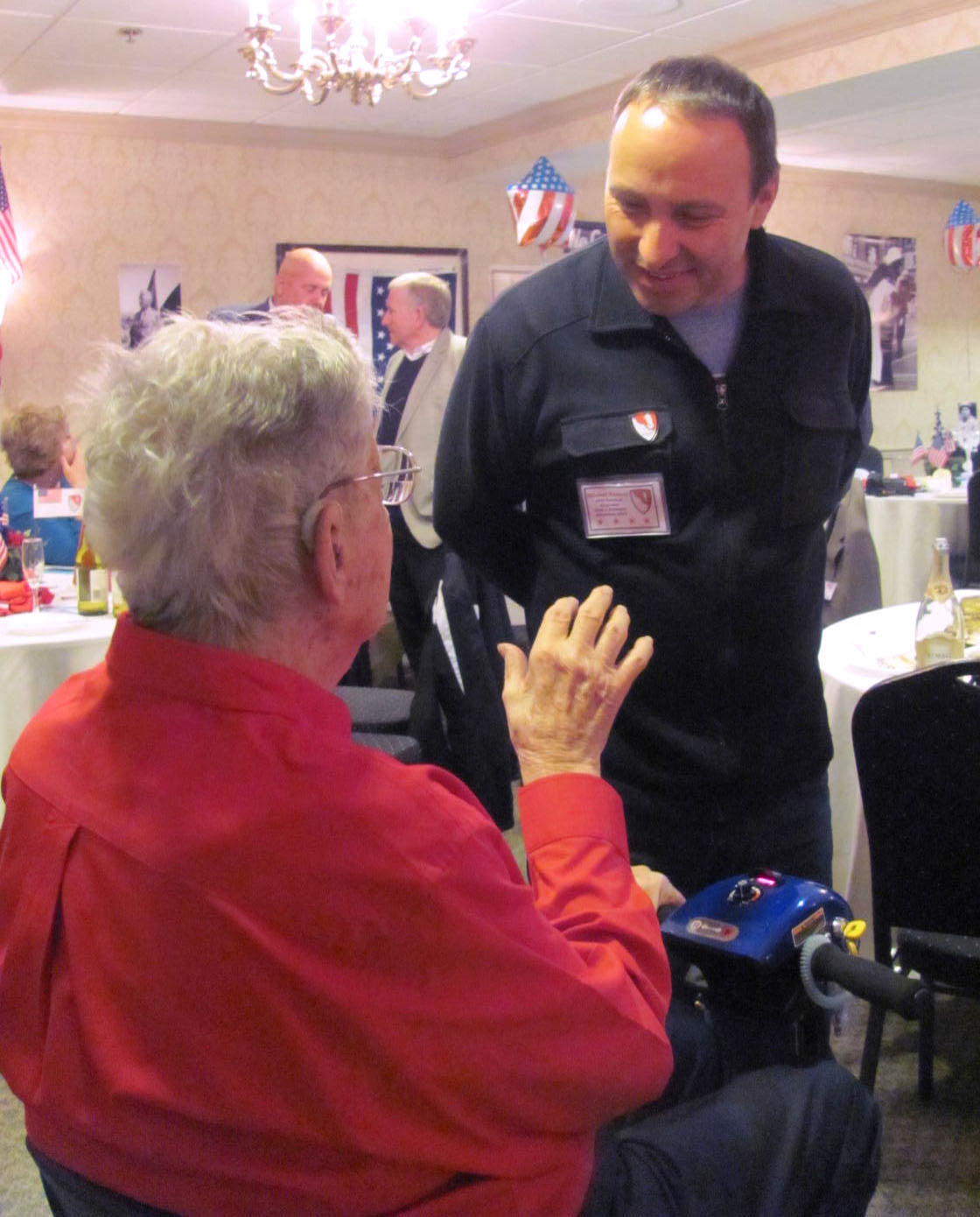 Michele Pascal talking with veterans Mike Cassic.jpg